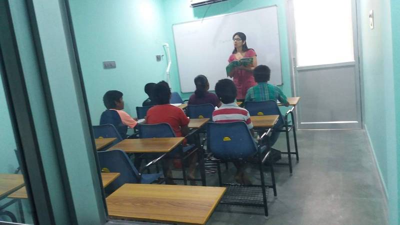 Teacher reading a story to the class